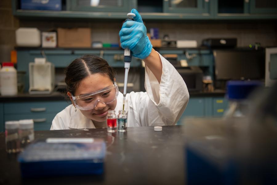 Female student in lab.